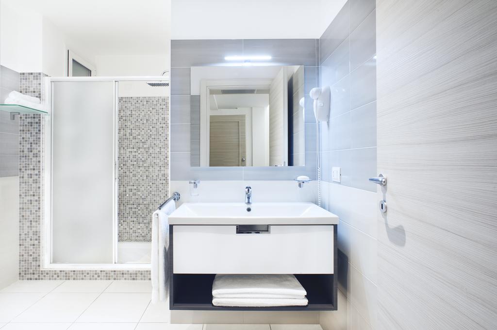 Vuelle Residence Apartments Capo dʼOrlando Habitación foto