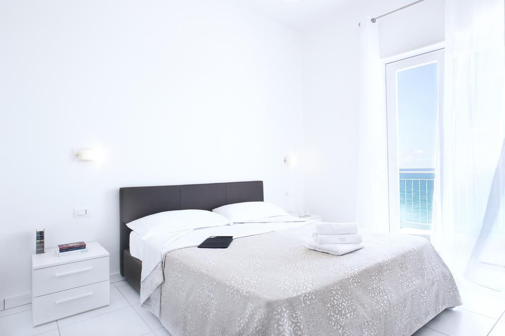 Vuelle Residence Apartments Capo dʼOrlando Habitación foto